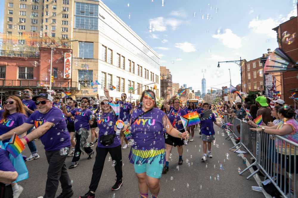 NYU marchers walk through bubbbles
