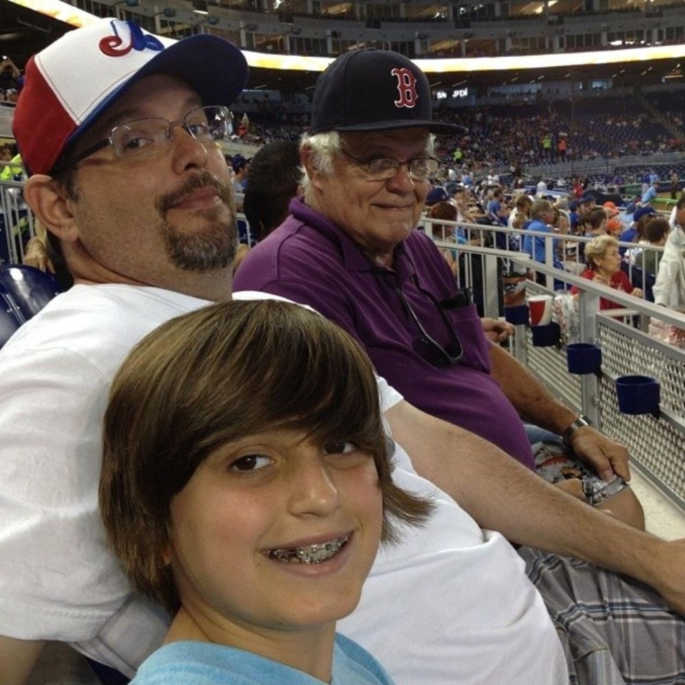 My father in Boston Red Sox hat, myself in Montreal Expos hat and my nephew at Marlins Park.