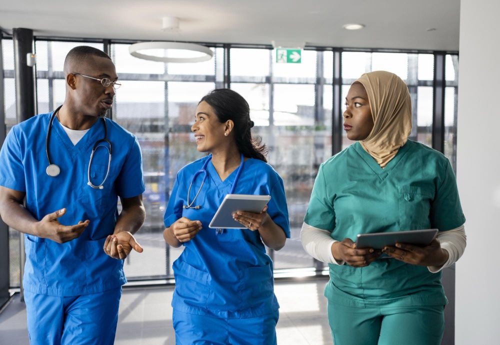 Image of three doctors in a hospital setting 