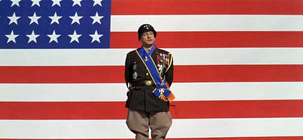 George Patton in front of an American flag giving some weird ass speech about stuff