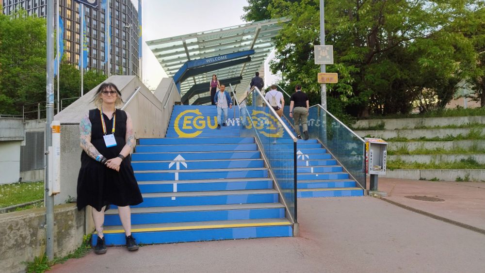 Entrance steps to the Vienna conference centre, with EGU stickers going up
