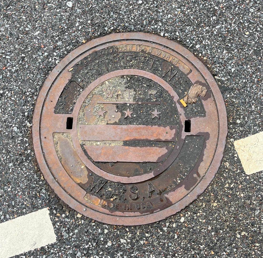 Water manhole cover. H Street NE