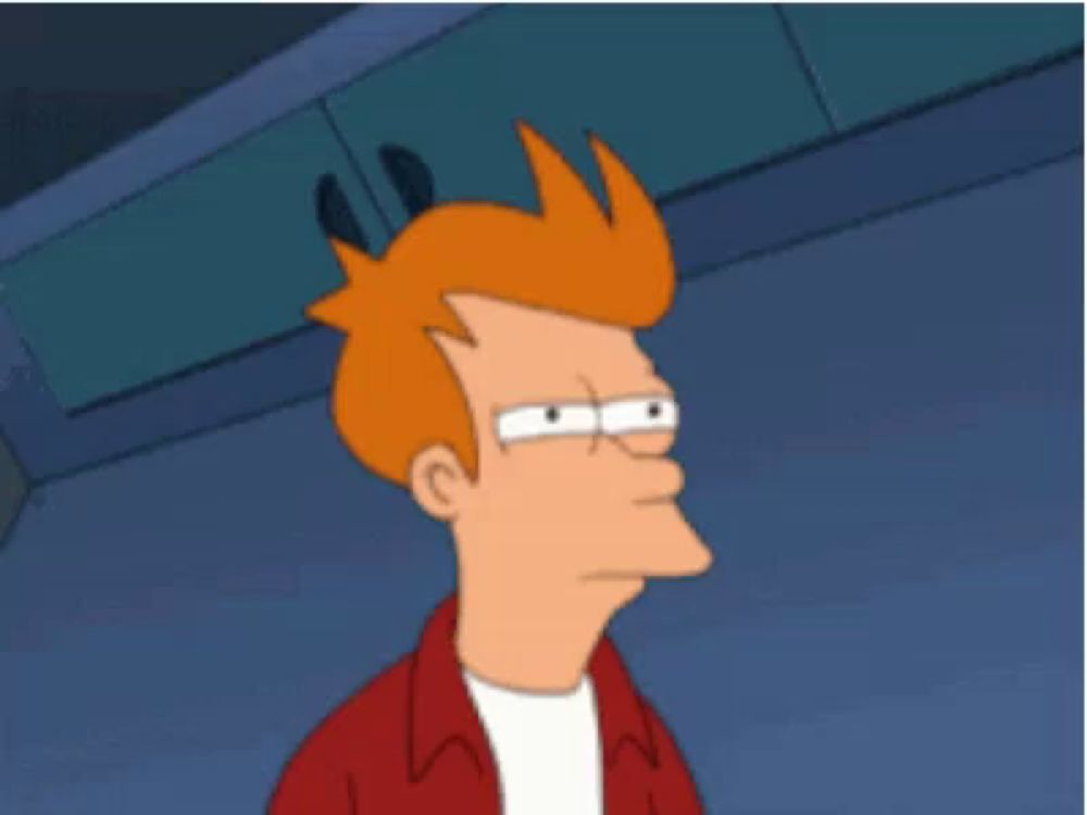 fry from futurama is wearing glasses and a red jacket .