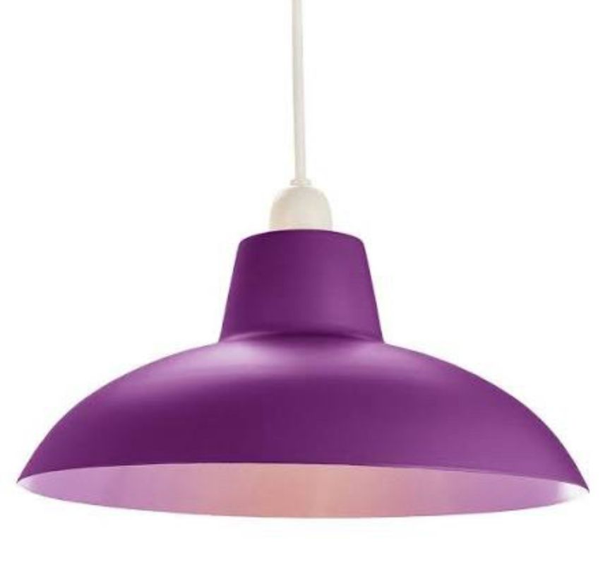 A purple lampshade with a wide brim and "cap", such that it could resemble a fashionable woman's hat. 