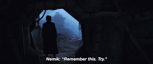 Gif of Cassian Andor standing in the entrance of an abandoned shuttle. The voice of Nemik says “Remember this. Try.”