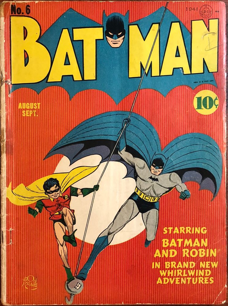 Batman and Robin swing into action. 