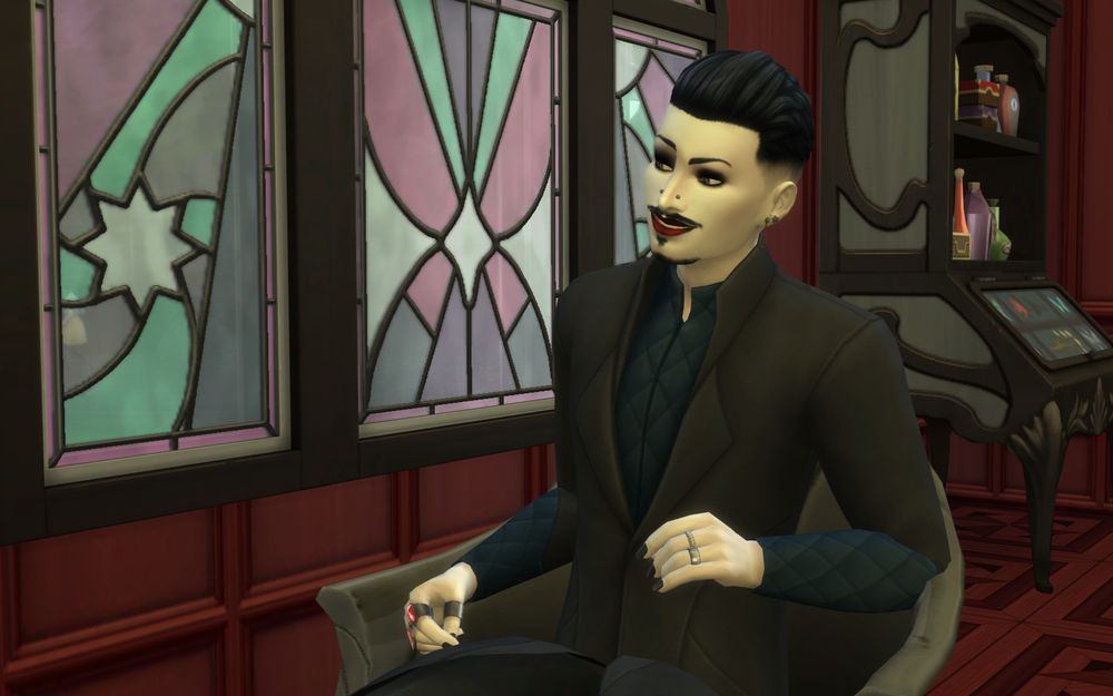 Ahriman sits in the armchair and looks smug.