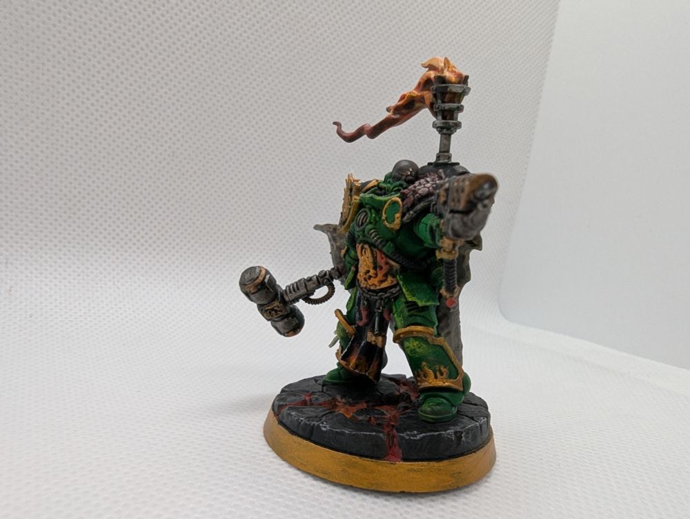 Adrax Agatone, a painted Space Marines Salamander miniature. Left view.