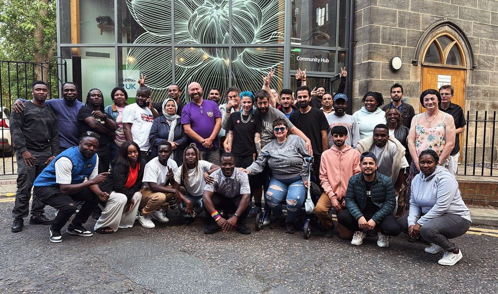 25 people outside Age UK building 