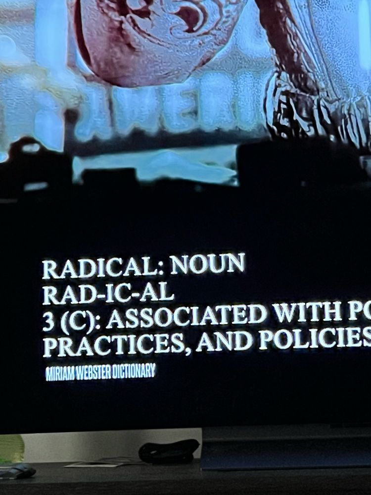 A photo of a Tom Kean ad with Merriam Webster spelled incorrectly as Miriam Webster 