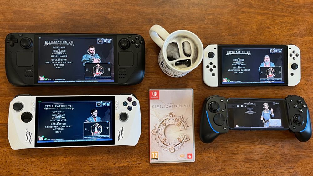 Civ 7 on a Steam Deck, Civ 7 on an Aya Neo or something, Civ 7 on a Switch, Civ 7 streamed to a mobile device in a controller shell, Civ 7 physical Switch copy, and an iced coffee in a mug. That’s our Mikhail!