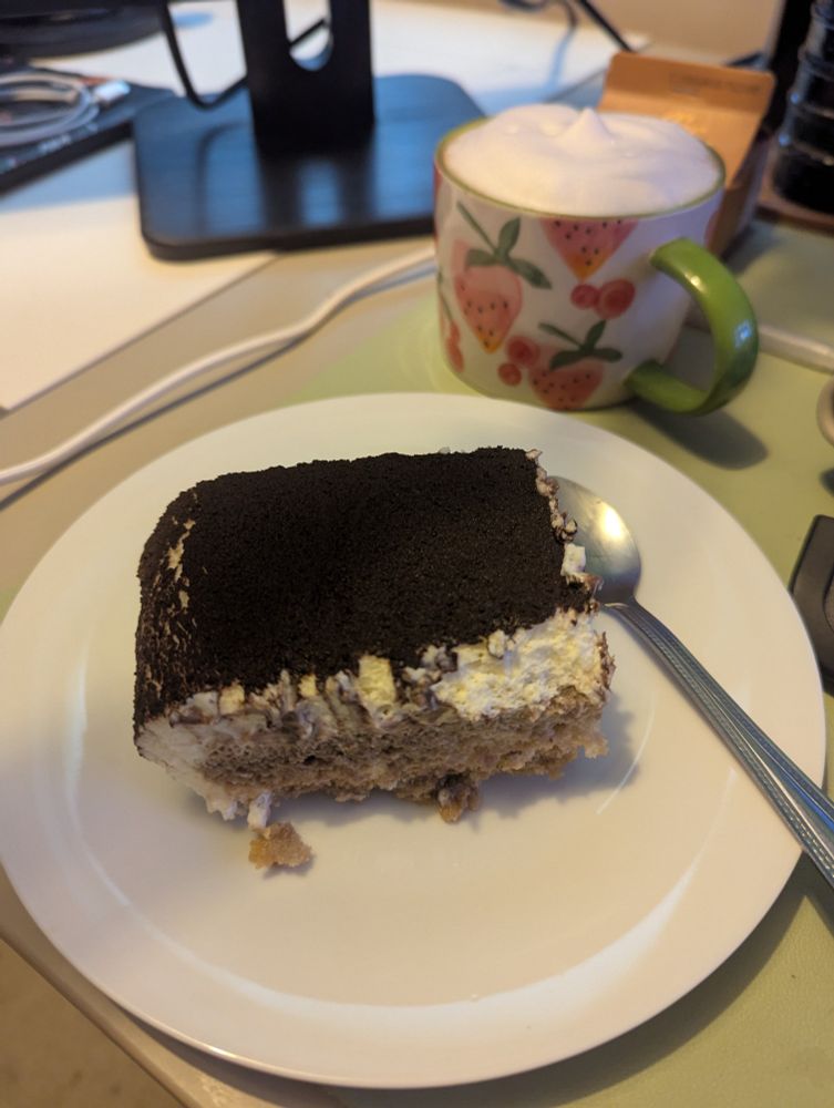 kae's homemade tiramisu next to a cappuccino!