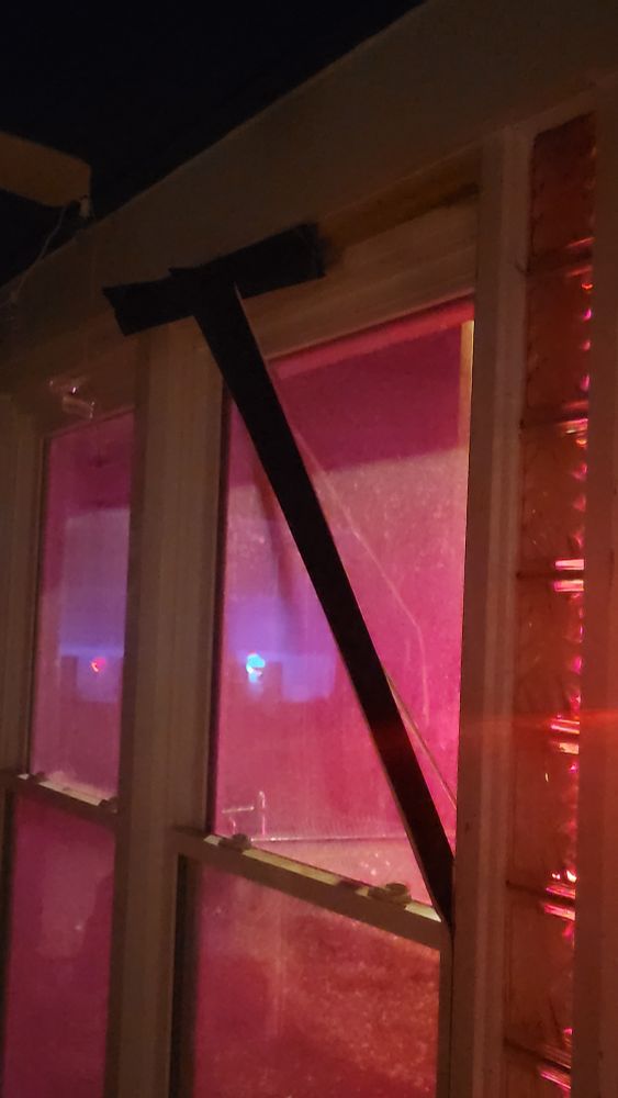 Trim on porch window blown off by string lights that exploded. 