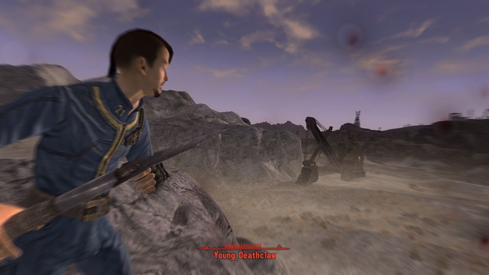 a customized courier from Fallout New Vegas, wearing a blue Vault suit, holds a spear. he's looking to the side, where a young deathclaw is attacking him. the deathclaw's health bar shows it's barely been hurt.