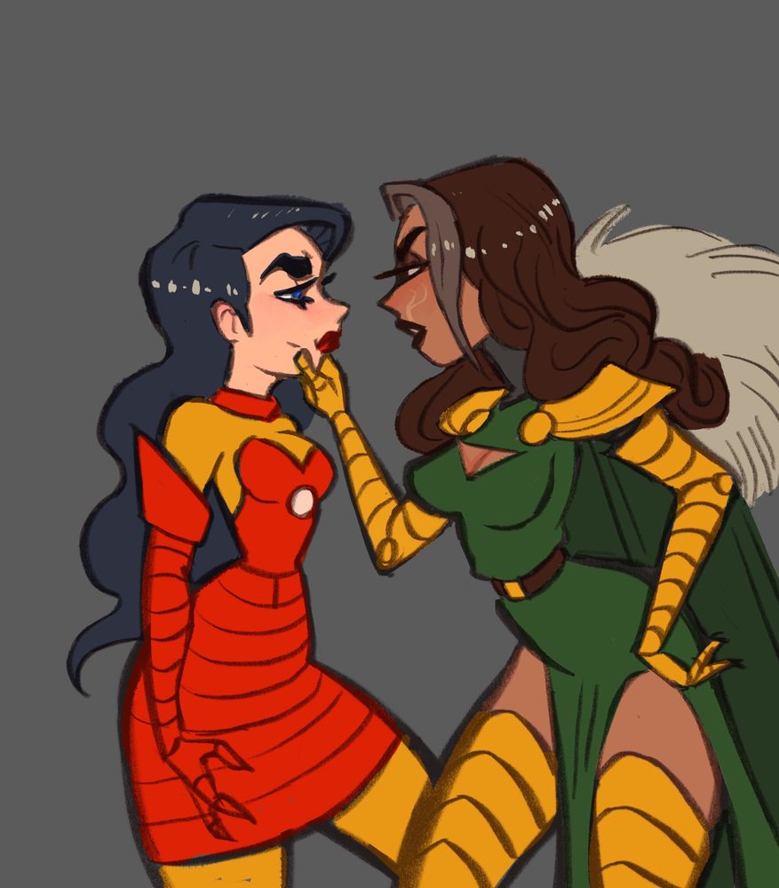 iron man and doctor doom of marvel comics as women with doom grabbing stark’s face and scolding her but looking suspiciously like they’re going to kiss. or fight. or both