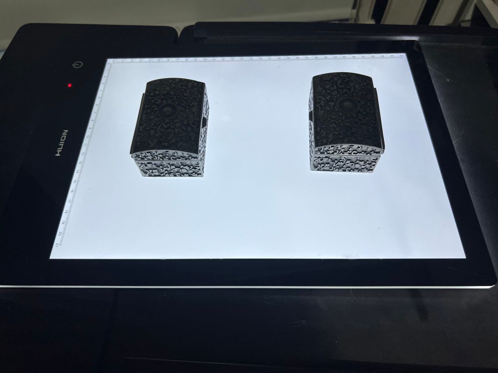 Huion light table I got in a charity shop for 4 Eur and two metal chests with dice I got from Rejistania