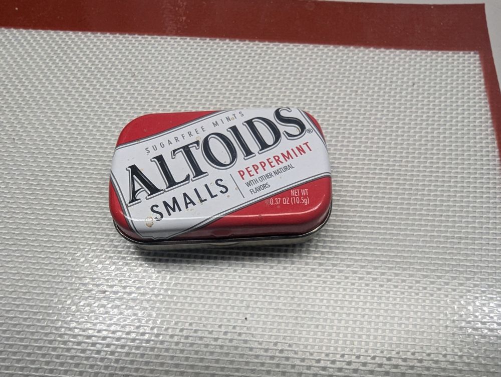 Altoids Small tin canister.