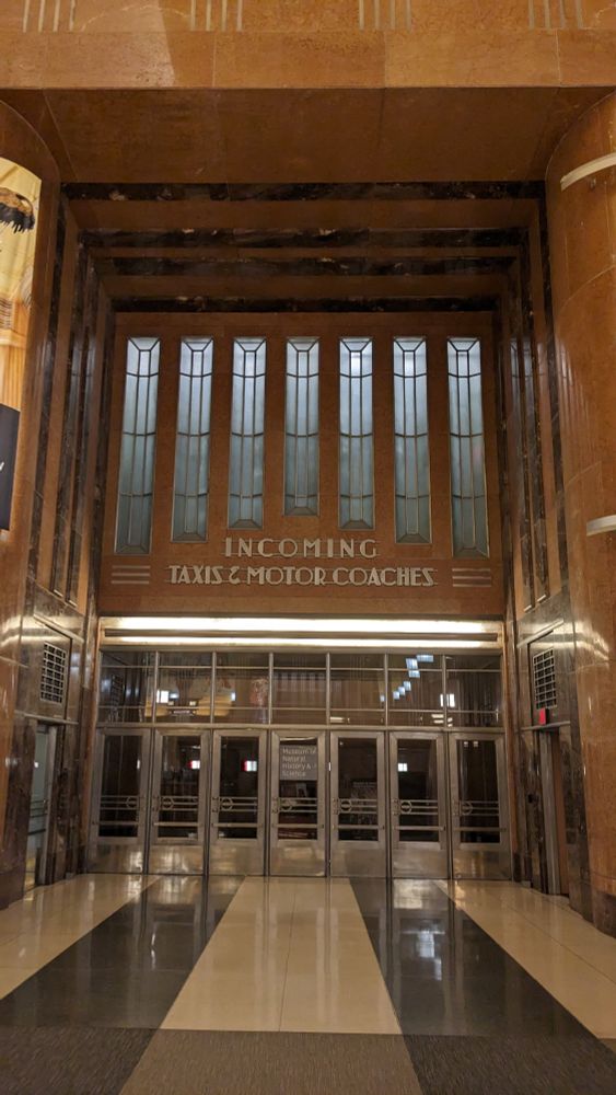 There was a side exit labeled "incoming taxis and motor coaches" that I didn't see in the film, but it is cool 