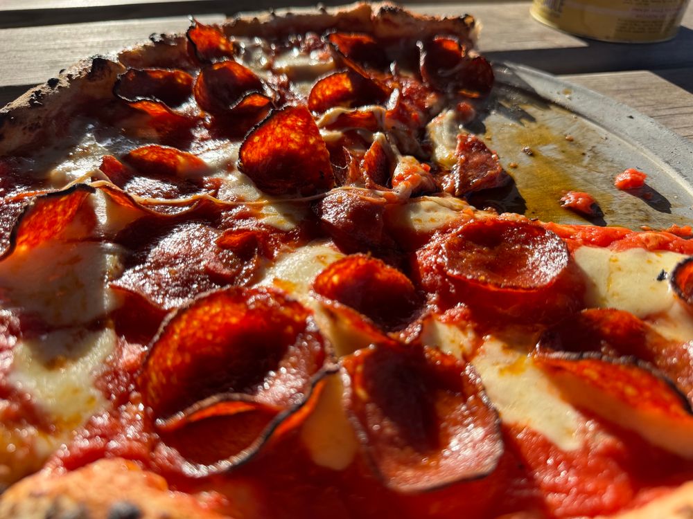 A Neapolitan style pizza with pepperoni 