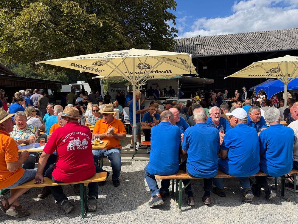Lots of beer tables at a fest. 