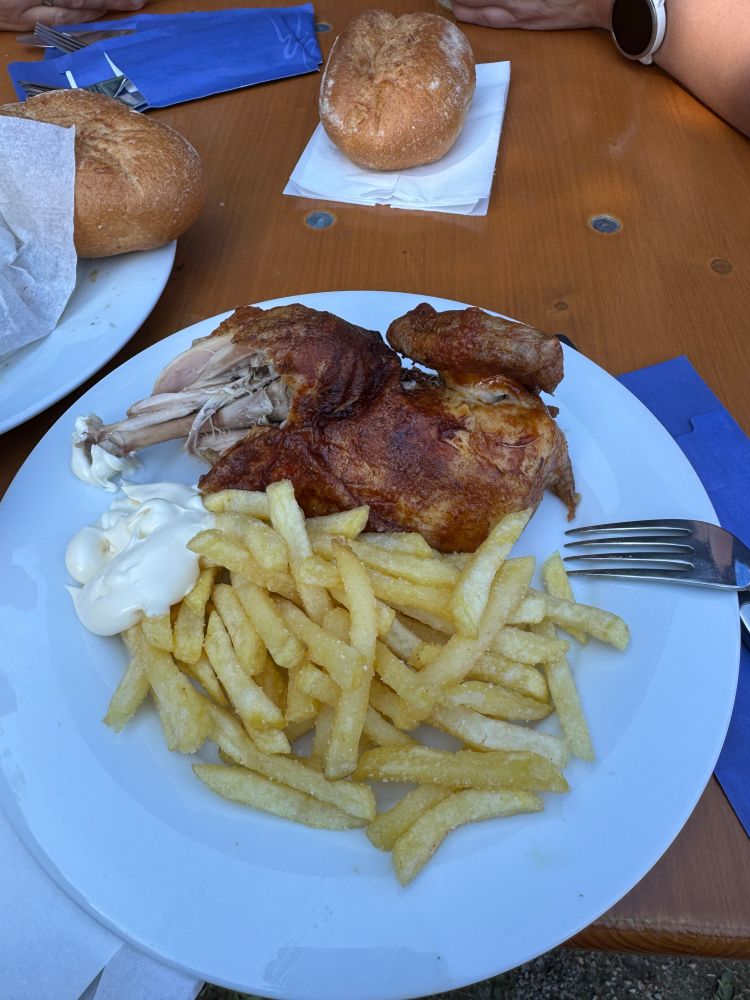 Half a fried chicken and pommes. 