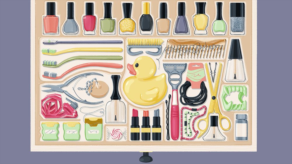 Screenshot of Bathroom drawer level from puzzle video game A Little to the Left, fully solved. Drawer is open with a medley of objects neatly organized inside it, such as nail polish bottles, a rubber ducky, toothbrushes, razors, scissors, amongst other items.