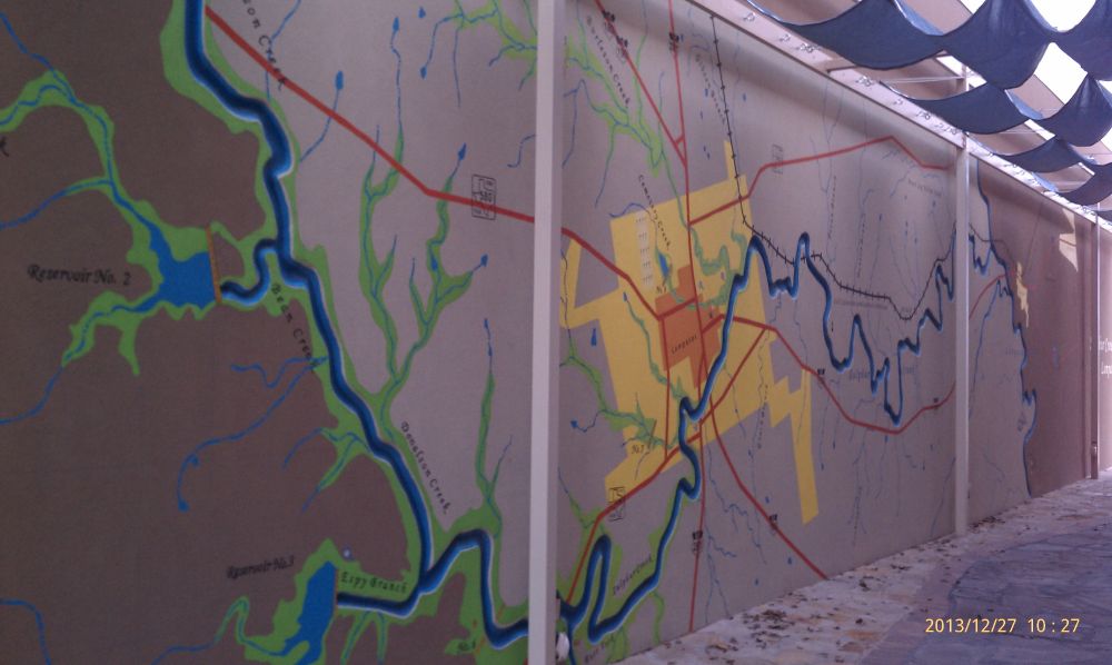 Mural on building wall of map of rivers and Lampasas watershed.