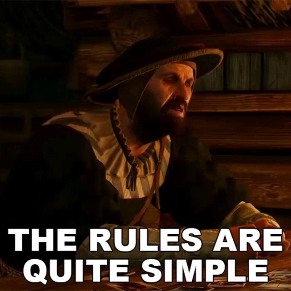 a man sitting at a table with the words " the rules are quite simple "