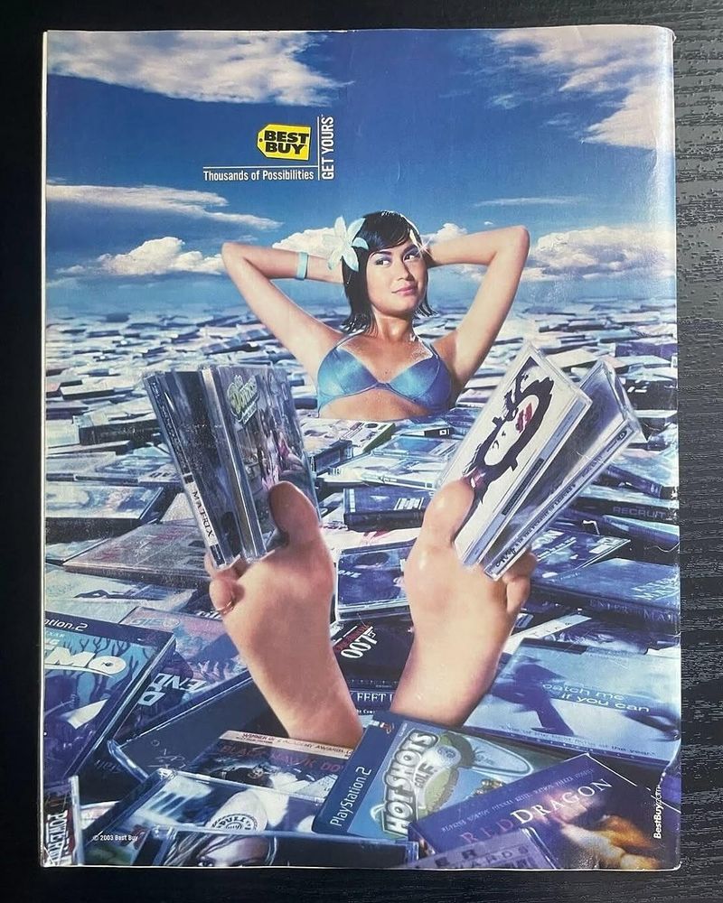 Time Magazine December 22, 2003 Back Cover featuring an advertisement for Best Buy. The cover hysterically features a woman gripping CDs (nuts) with her beautiful feet, contrasting dramatically with the front cover of this issue. Evocative of Tarantino lmao