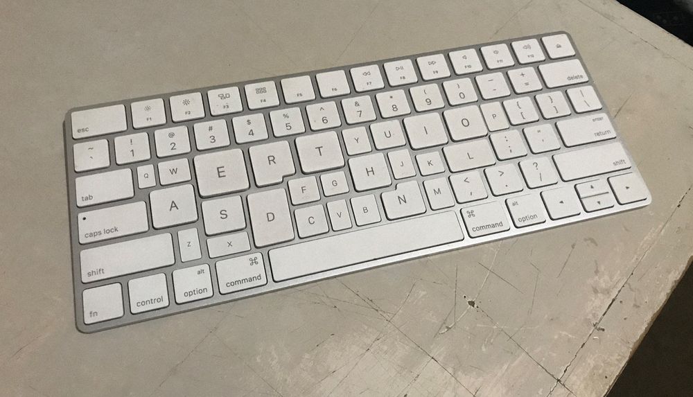 A photo of an Apple keyboard with the alphabet keys changed depending on the frequency of letters in English in this case. the E, A, D, T, I, O, L and N keys are quite large, while Q, X, Z, K, and V are quite small.