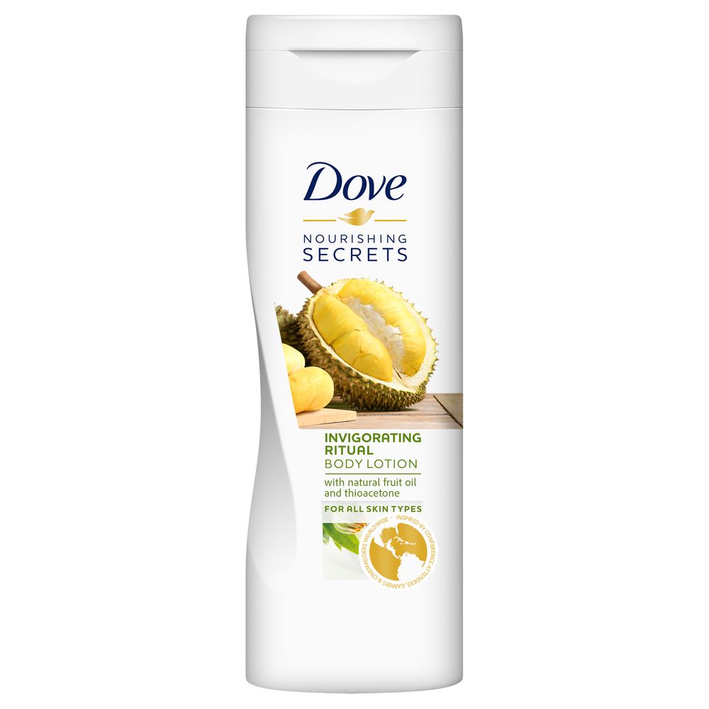 A photo of a plastic squeezy bottle of DOVE nourishing secrets moisturiser, with natural fruit oil and thioacetine. On the front is a picture of a luscious tropical looking durian.