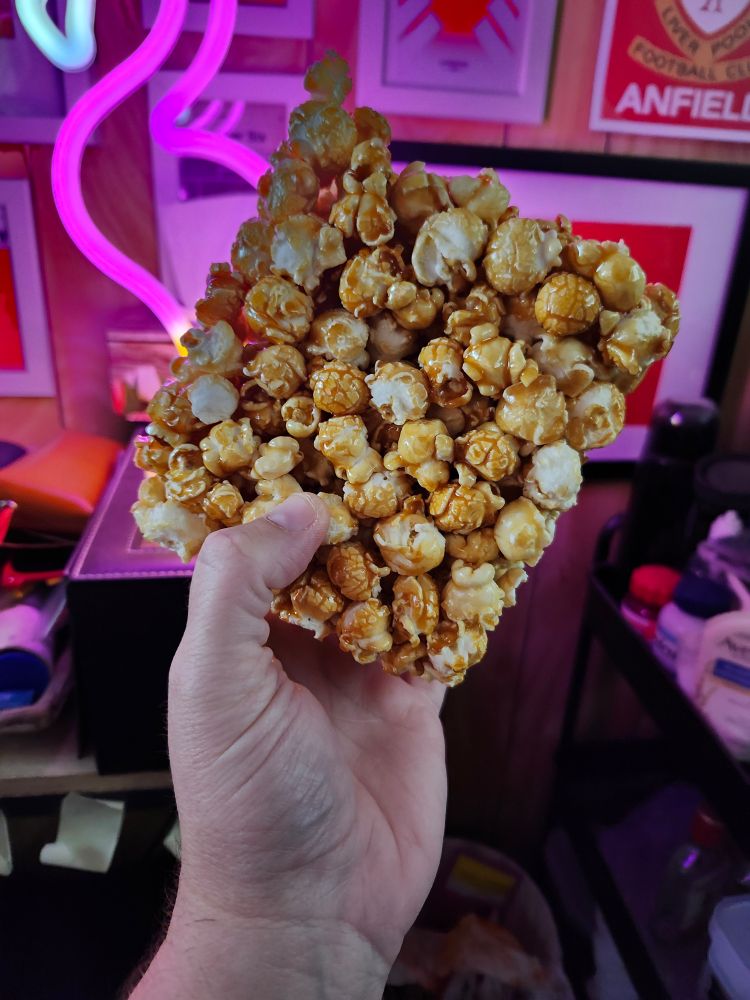 Brick of hardened caramel corn