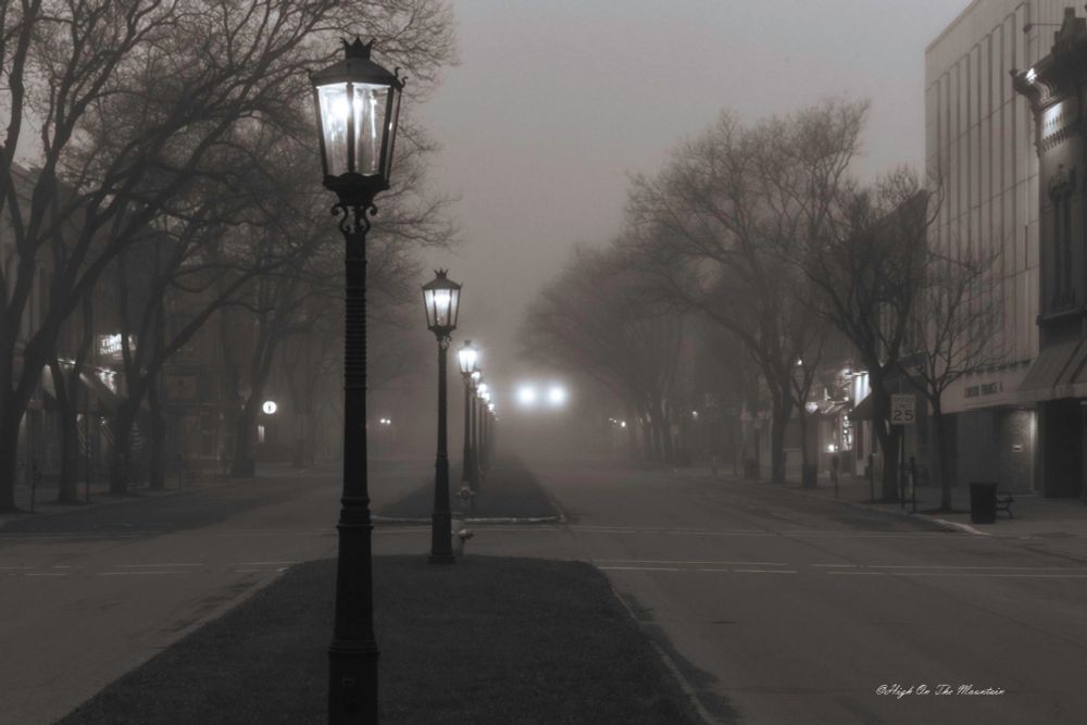 Photo of a gaslit street, foggy night, by 
Matthew Stevens