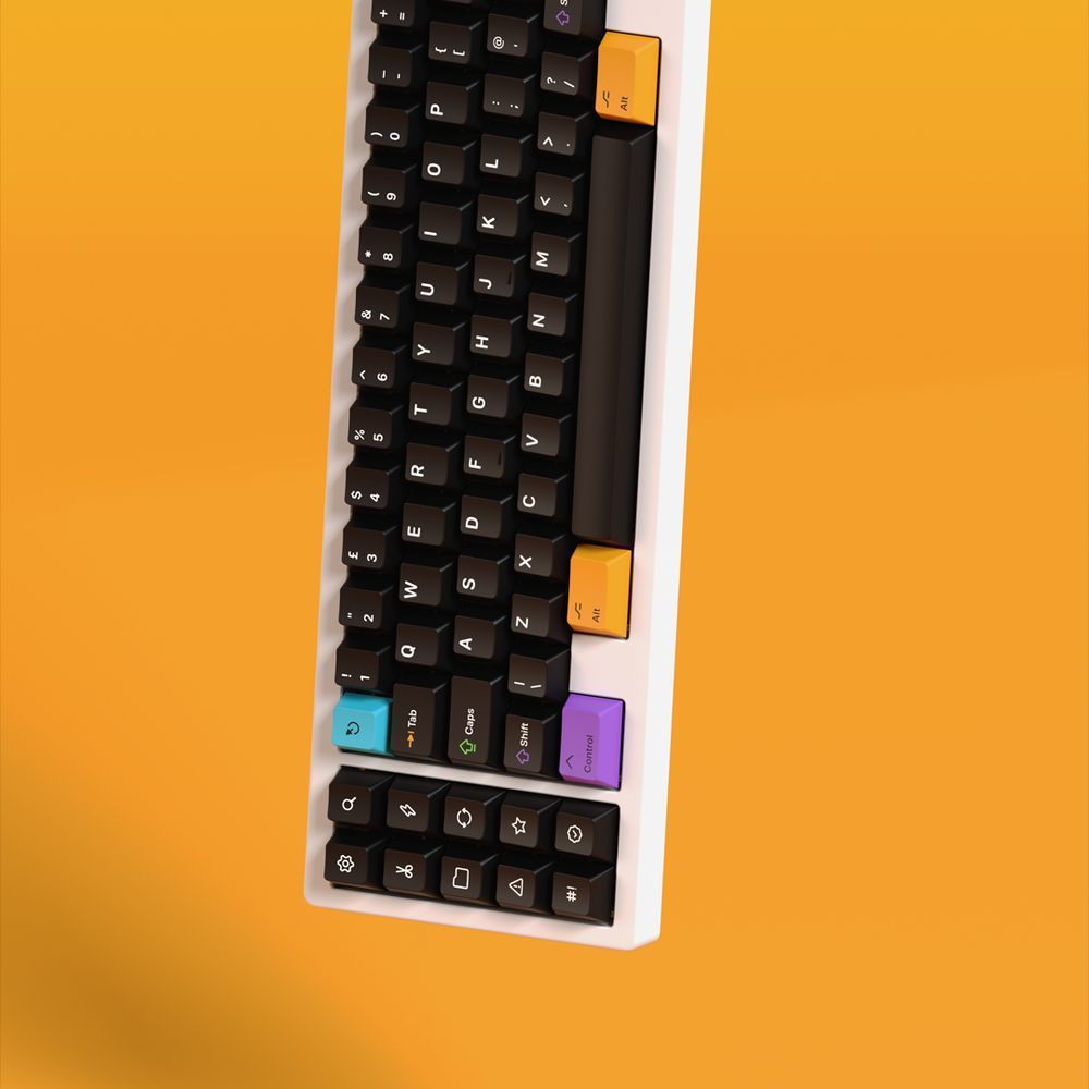 An white mechanical keyboard dangles vertically precariously, with black keycaps and white legends, and several modifier keys showing brightly coloured keys with black legends