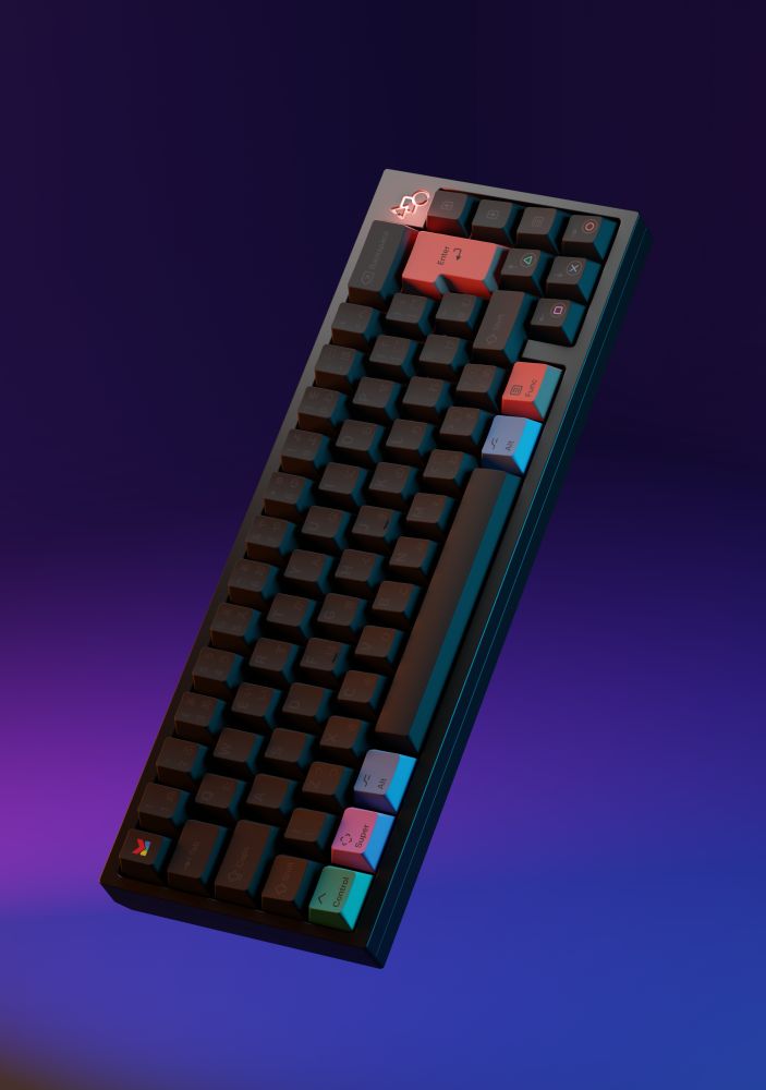 A render of a mechanical keyboard with dark grey keycaps, green, blue and pink accented modifier keys, and circle, cross, triangle and square icons on the cursor keys.