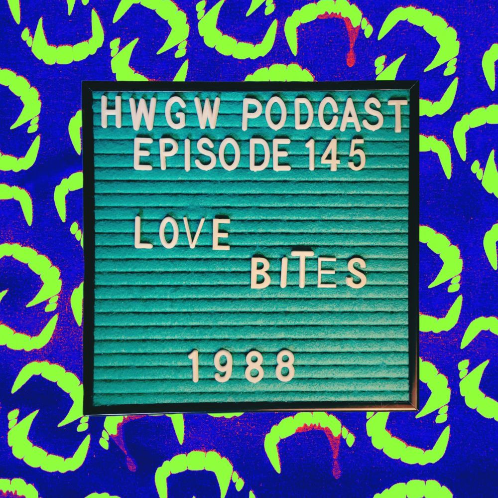 Marquee Mark is a small square teal felt marquee with white letters. He reads "HWGW Podcast, Episode 145: LOVE BITES (1988)". The background is a pattern of vampire fangs