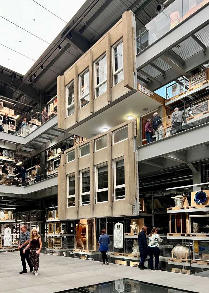 A close up of items on display, including concrete window surrounds from the Smithsons’ Robin Hood Gardens.