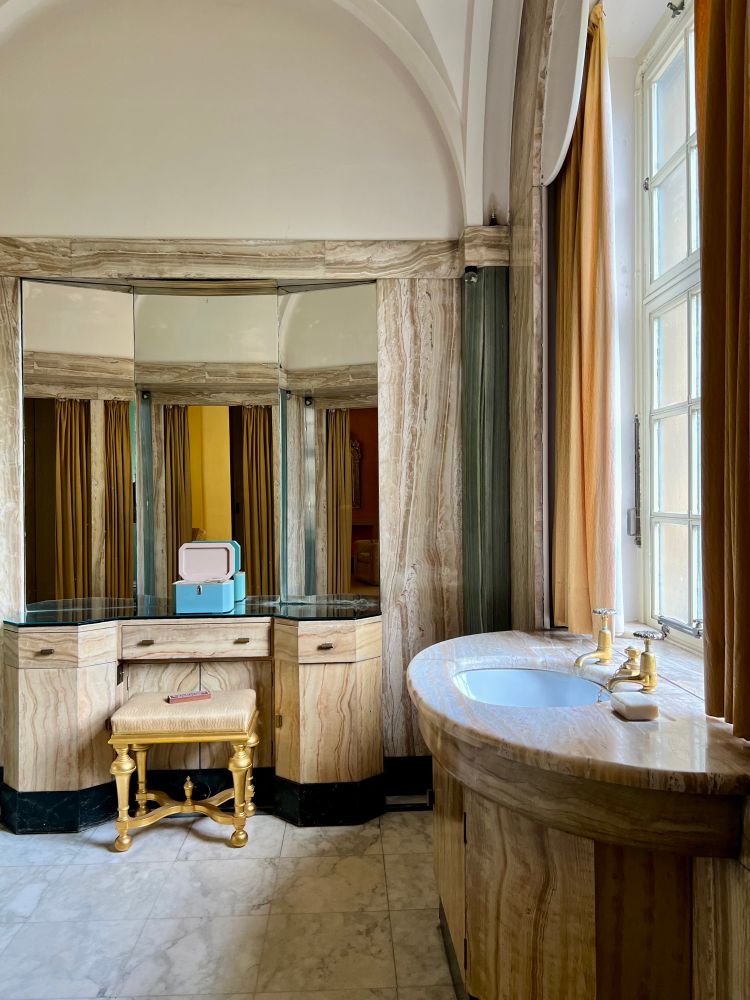 A built-in stone vanity and sink.