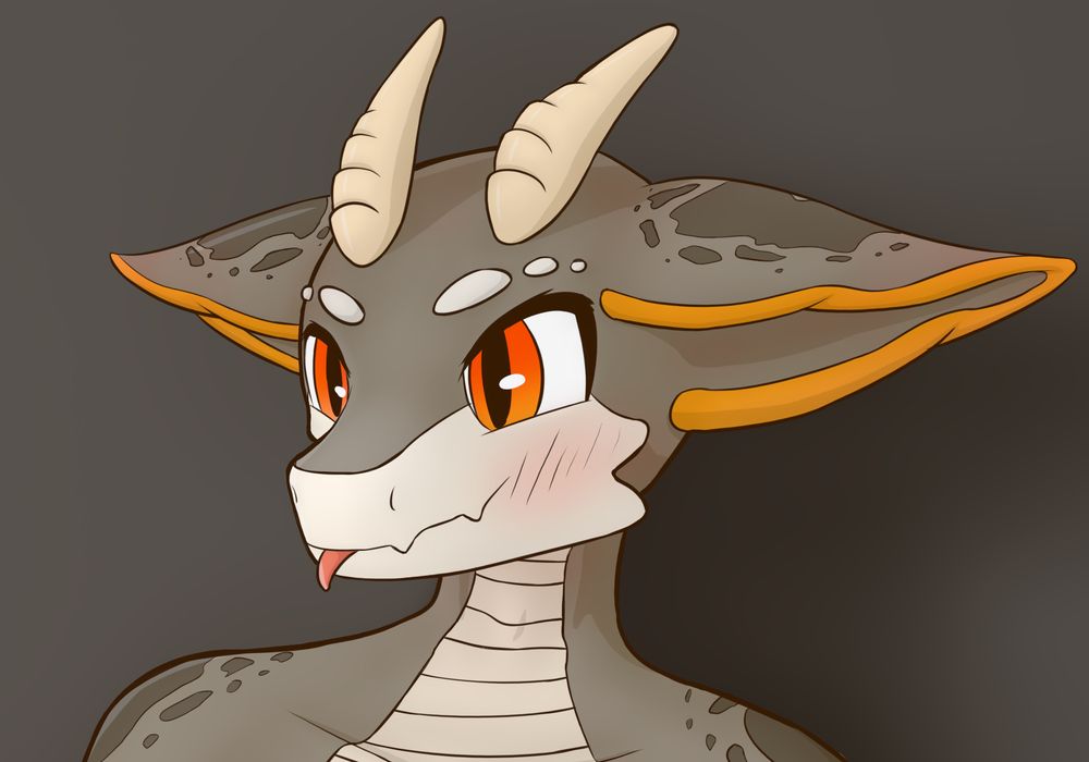 A close up of the lizard/dragon's head. Its sticking its tongue out playfully.