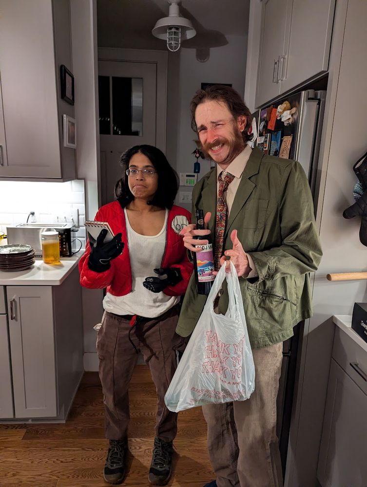 the two of us at a Halloween party showing off our costumes.