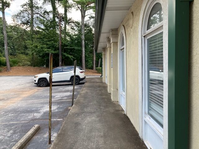 The view from the door from where I rang the bell. Even if you look behind the SUV, there is no VOTE HERE sign visible.