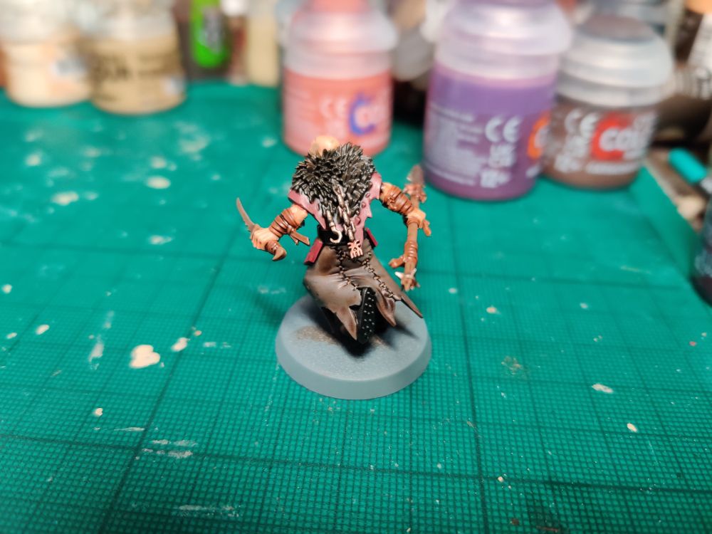 Claws of Karanak mook with spear and knife - back