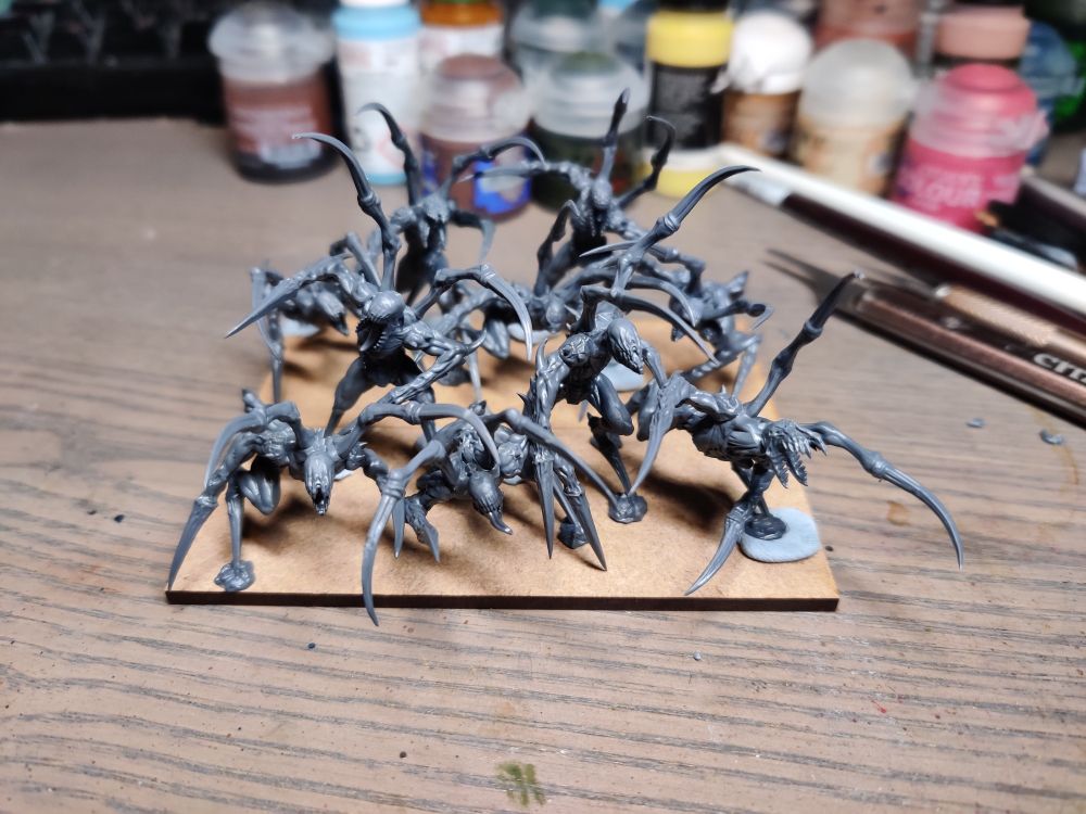 Nightstalker Tormentors, placed on bases and posed to plan out next moves