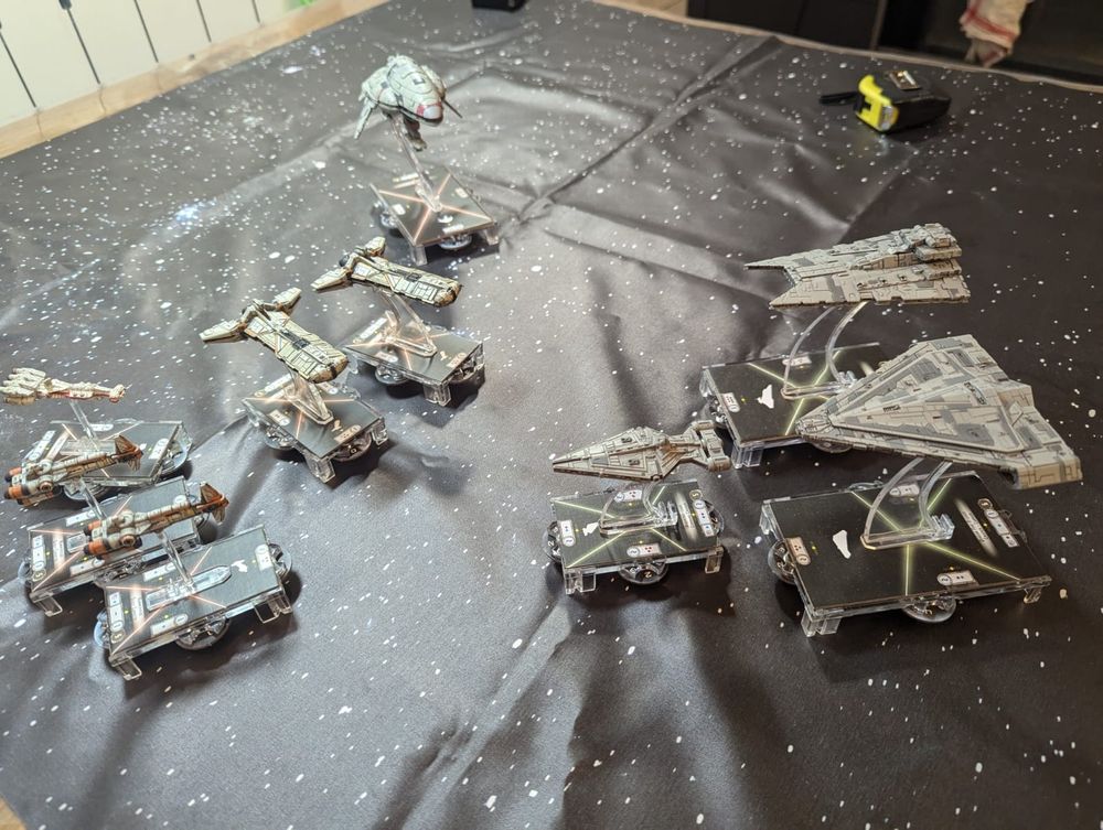 Void Admiral with Armada models, a tabletop with Star Wars battleship Miniatures. 