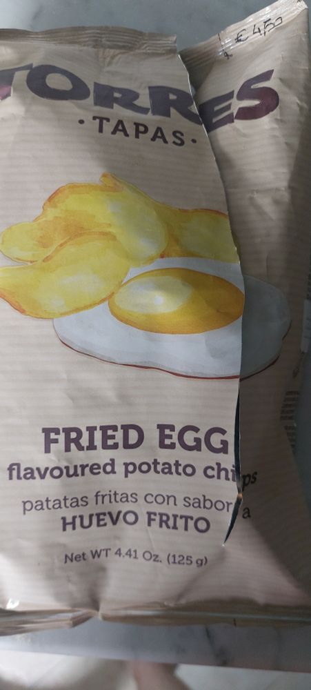 Picture of a bag of fried egg flavour crisps 