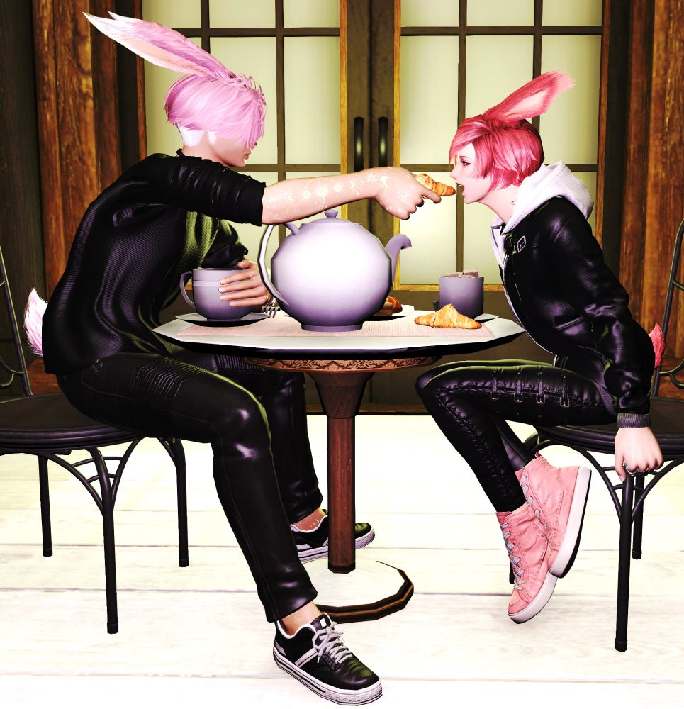 Two male Viera sit in a cafe/bakery, enjoying croissants and tea together. The pink-haired Viera reaches across the table, holding a croissant out to the red-haired Viera allowing him to take a bite. The red-haired Viera leans foward with his mouth open. 