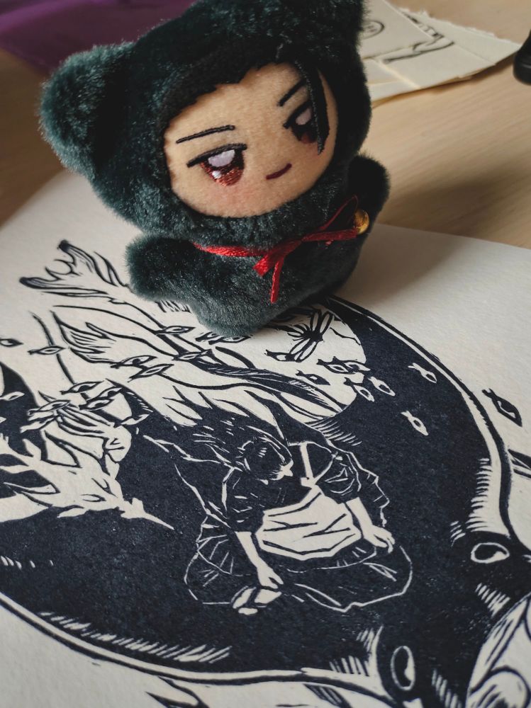 Chimi Geto plushie standing on a print of human Geto riding a manta ray curse