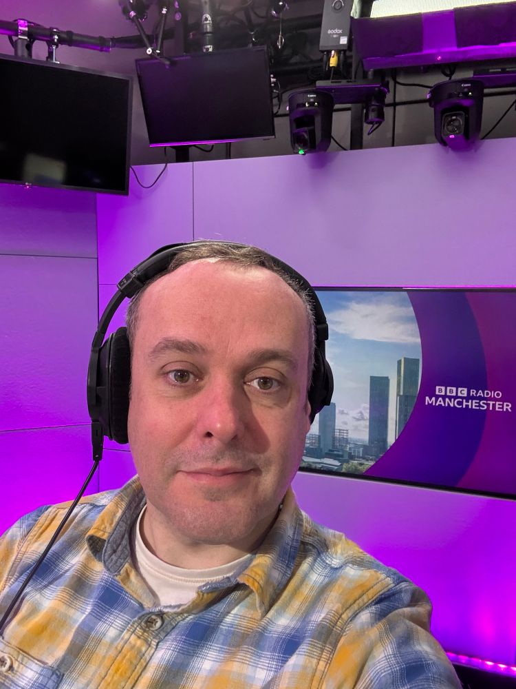 Pic of me with headphones on in studio 