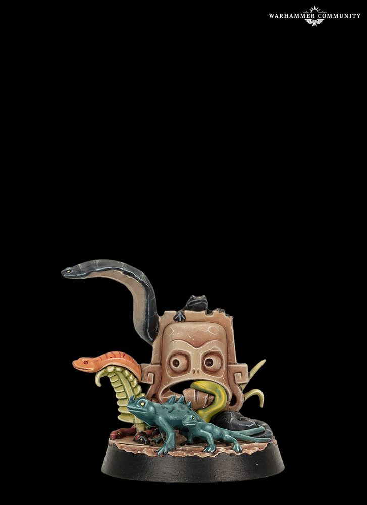 A miniature depicting a series of snakes and lizards emerging from a stylised, statuary head.