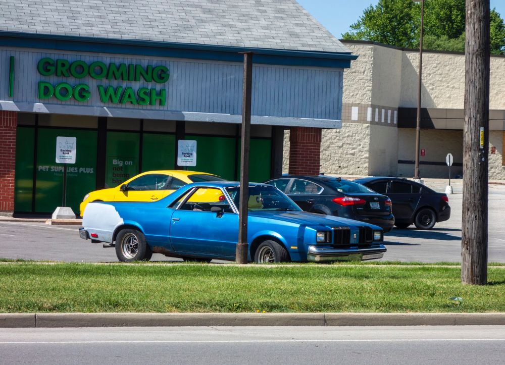 An early ‘80s Chevy El Camino with the fascia of an Oldsmobile 442 grafted on to the snout.